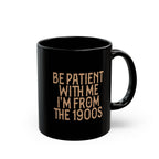 Vintage Humor Mug — "Be Patient With Me I'm From The 1900s" Black Coffee Cup (11oz, 15oz)